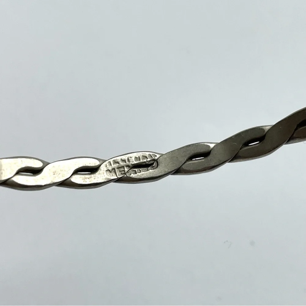 Pair of vintage unmarked sterling? flat twist link Mexico bangle bracelets